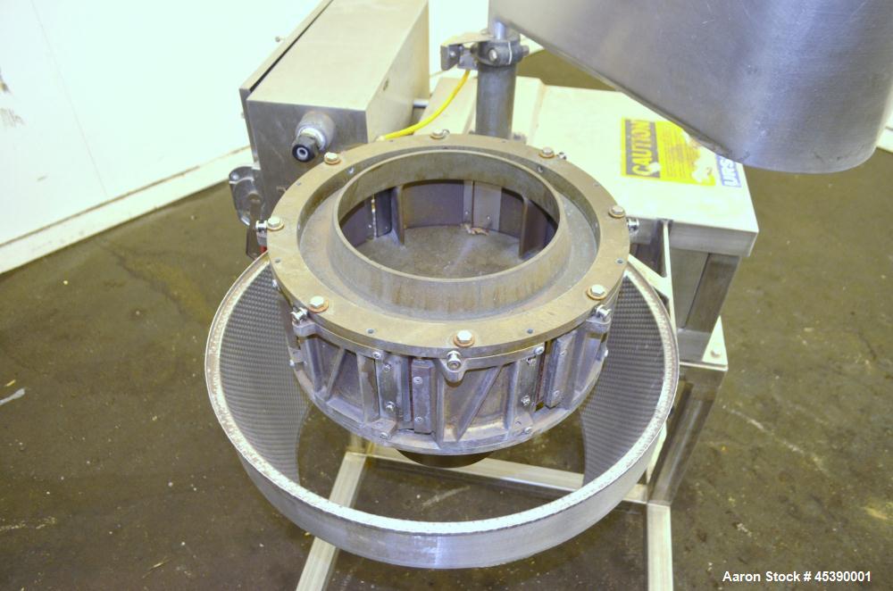 Used Urschel Slicer, Model CC, Stainless Steel. Maximum input product size 3-1/2". Unit consists of (1) swing away feed hopper, upper, and lower discharge chute, bearing housing, and cutting head sup...