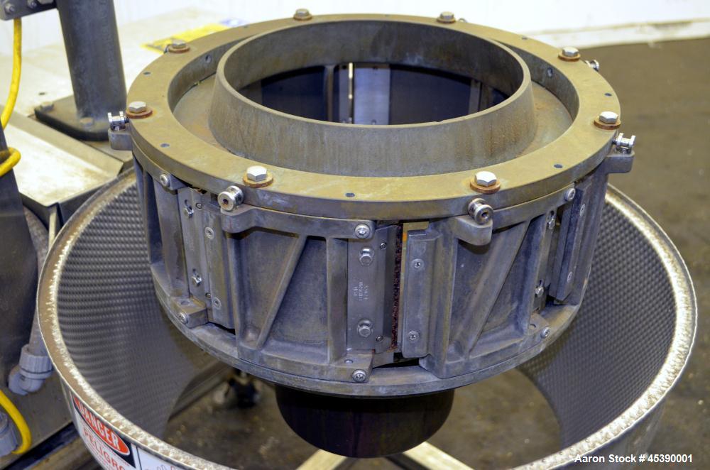 Used Urschel Slicer, Model CC, Stainless Steel. Maximum input product size 3-1/2". Unit consists of (1) swing away feed hopper, upper, and lower discharge chute, bearing housing, and cutting head sup...