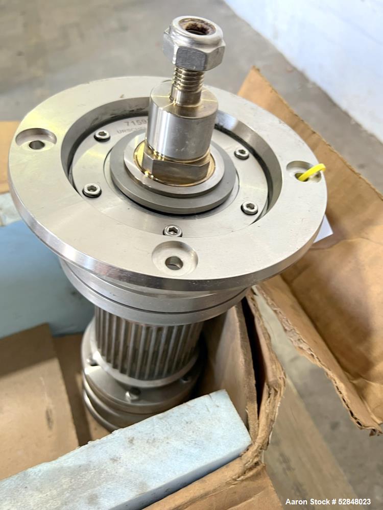 Used- Urschel Comitrol Spindle Drive Assembly, for a Model 9300, Stainless Steel Construction. 4" diameter x 4" long.