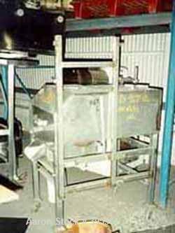 Used Urschel Slicer/Dicer, Model L, Stainless Steel. Approximately (2) 8" wide rotors, driven by a 1/2 hp gearmotor. Capacity 3000 pounds per hour. 6-1/2" x 6-3/4" feed chute, discharge roll, approxi...