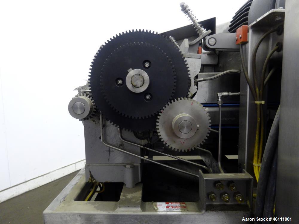Used Urschel Dicer, Strip Cutter, and Shredder, Model M, 304 Stainless Steel. Will produce square or rectangular dices from 1/8" x 3/16" to 1-1/2" x 3", maximum thickness 1". Belt feed approximately ...