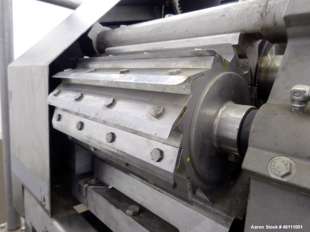 Used Urschel Dicer, Strip Cutter, and Shredder, Model M, 304 Stainless Steel. Will produce square or rectangular dices from 1/8" x 3/16" to 1-1/2" x 3", maximum thickness 1". Belt feed approximately ...