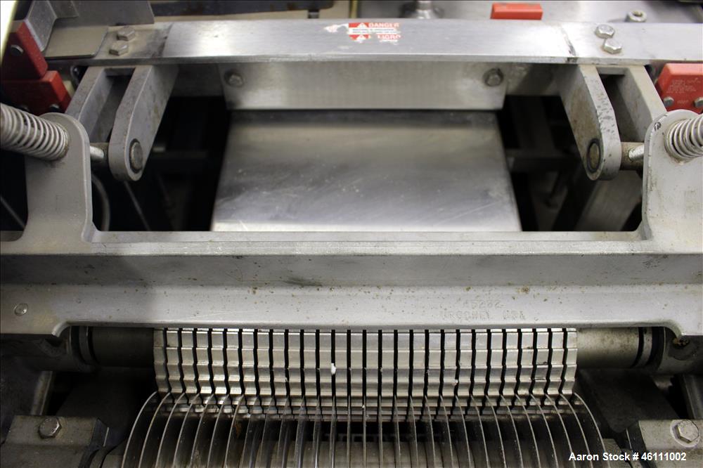 Used Urschel Dicer, Strip Cutter, and Shredder, Model M, 304 Stainless Steel. Will produce square or rectangular dices from 1/8" x 3/16" to 1-1/2" x 3", maximum thickness 1". Belt feed approximately ...