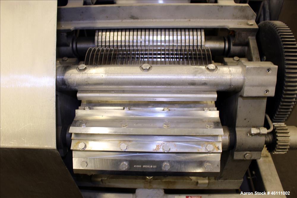 Used Urschel Dicer, Strip Cutter, and Shredder, Model M, 304 Stainless Steel. Will produce square or rectangular dices from 1/8" x 3/16" to 1-1/2" x 3", maximum thickness 1". Belt feed approximately ...