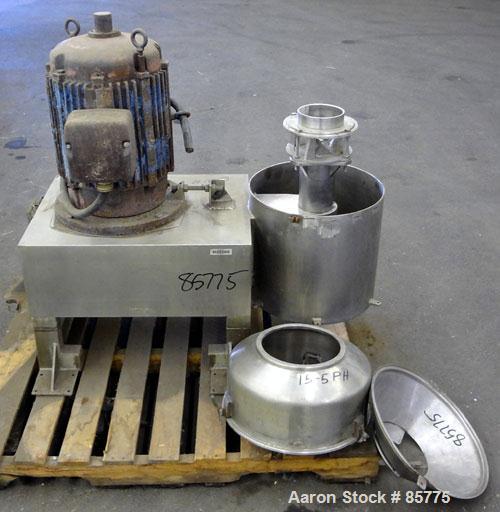Used Urschel Comitrol Processor, Model MG1700, 15-5 PH Stainless Steel. Approximate 6" diameter impeller, microcut cutting head. Top feed with hopper, bottom discharge hopper. Driven by an approximat...