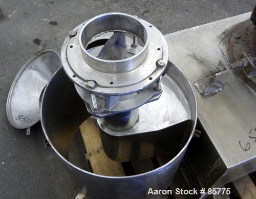Used Urschel Comitrol Processor, Model MG1700, 15-5 PH Stainless Steel. Approximate 6" diameter impeller, microcut cutting head. Top feed with hopper, bottom discharge hopper. Driven by an approximat...