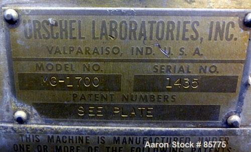 Used Urschel Comitrol Processor, Model MG1700, 15-5 PH Stainless Steel. Approximate 6" diameter impeller, microcut cutting head. Top feed with hopper, bottom discharge hopper. Driven by an approximat...