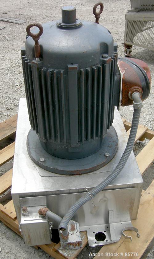 USED: Urschel Comitrol processor, model MG1700, 15-5PH stainless steel. Approximate 6" diameter impeller, microcut cutting head. Top feed with hopper, bottom discharge hopper. Driven by a 30 hp motor...