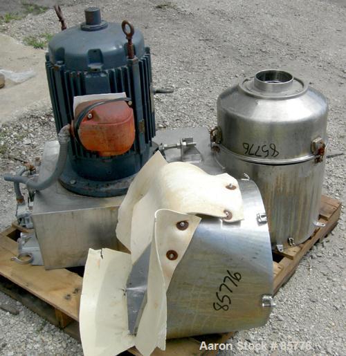 USED: Urschel Comitrol processor, model MG1700, 15-5PH stainless steel. Approximate 6" diameter impeller, microcut cutting head. Top feed with hopper, bottom discharge hopper. Driven by a 30 hp motor...