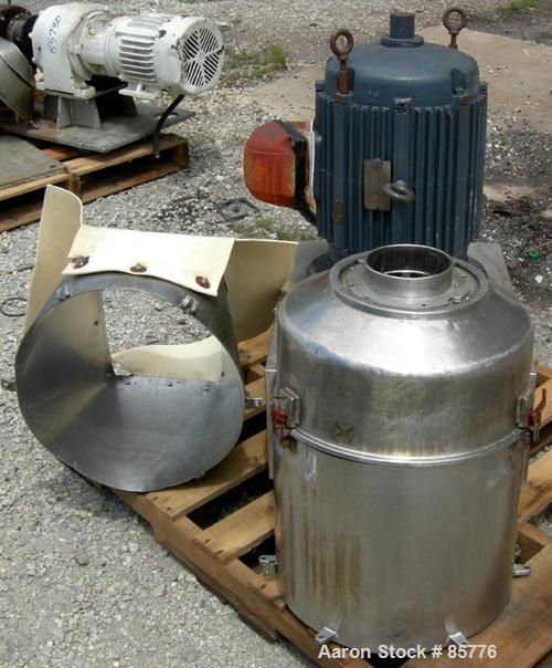 USED: Urschel Comitrol processor, model MG1700, 15-5PH stainless steel. Approximate 6" diameter impeller, microcut cutting head. Top feed with hopper, bottom discharge hopper. Driven by a 30 hp motor...