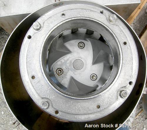 USED: Urschel Comitrol processor, model MG1700, 15-5PH stainless steel. Approximate 6" diameter impeller, microcut cutting head. Top feed with hopper, bottom discharge hopper. Driven by a 30 hp motor...
