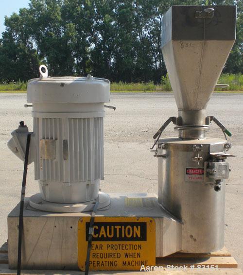 Used Urschel Comitrol Processor, Model MG, 304 stainless steel. Approximately 6" diameter x 3" deep cutting head. 3 blade impeller. Driven by a 20 hp, 3/60/208-220/440 volt, 3530 rpm motor. 5" diamet...