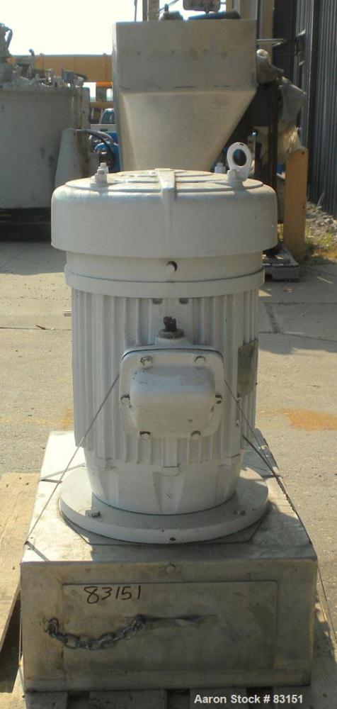 Used Urschel Comitrol Processor, Model MG, 304 stainless steel. Approximately 6" diameter x 3" deep cutting head. 3 blade impeller. Driven by a 20 hp, 3/60/208-220/440 volt, 3530 rpm motor. 5" diamet...