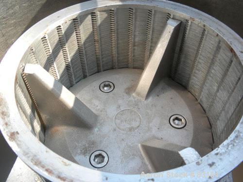 Used Urschel Comitrol Processor, Model MG, 304 stainless steel. Approximately 6" diameter x 3" deep cutting head. 3 blade impeller. Driven by a 20 hp, 3/60/208-220/440 volt, 3530 rpm motor. 5" diamet...
