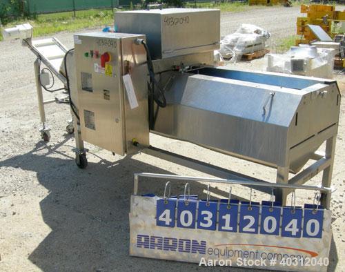 Used Urschel Dicer, Model M, 304 stainless steel. Designed for dicing or strip cutting food products. 11" wide x 60" long infeed conveyor, (1) feed roll, (17) 4 1/2" diameter circular knives, feed dr...