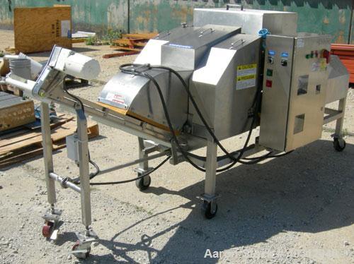 Used Urschel Dicer, Model M, 304 stainless steel. Designed for dicing or strip cutting food products. 11" wide x 60" long infeed conveyor, (1) feed roll, (17) 4 1/2" diameter circular knives, feed dr...