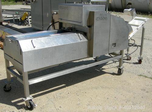 Used Urschel Dicer, Model M, 304 stainless steel. Designed for dicing or strip cutting food products. 11" wide x 60" long infeed conveyor, (1) feed roll, (17) 4 1/2" diameter circular knives, feed dr...
