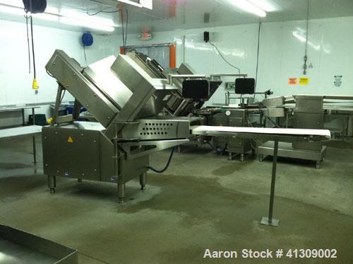 Used Weber Model 402 Meat Slicer capable of speeds up to 2400 slices per minute.Slice thickness .02" to 1.97" or .5 mm to 50 mm.Max blade revolutions 600 per minute.Product length 39.37" or 1000 mm.P...