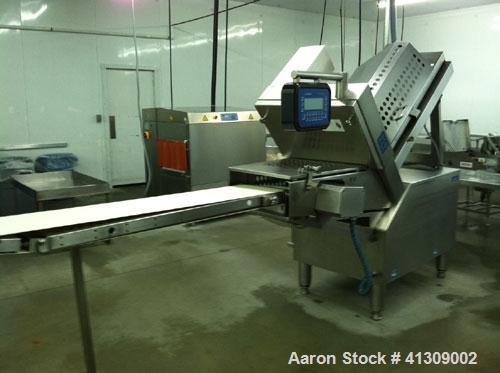 Used Weber Model 402 Meat Slicer capable of speeds up to 2400 slices per minute.Slice thickness .02" to 1.97" or .5 mm to 50 mm.Max blade revolutions 600 per minute.Product length 39.37" or 1000 mm.P...
