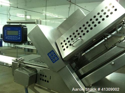 Used Weber Model 402 Meat Slicer capable of speeds up to 2400 slices per minute.Slice thickness .02" to 1.97" or .5 mm to 50 mm.Max blade revolutions 600 per minute.Product length 39.37" or 1000 mm.P...