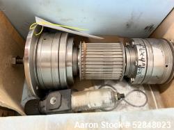 Used- Urschel Comitrol Spindle Drive Assembly, for a Model 9300, Stainless Steel Construction. 4" diameter x 4" long.