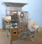 Used Urschel Model 2100 Comitrol Slicer. Urcshel 66755 3K030240U stainless steel cutting head. 30'' Deep stainless steel hopper with 22'' x 30'' infeed opening. Blunt blade horizontal agitator and st...