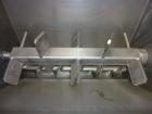 Used Urschel Model 2100 Comitrol Slicer. Urcshel 66755 3K030240U stainless steel cutting head. 30'' Deep stainless steel hopper with 22'' x 30'' infeed opening. Blunt blade horizontal agitator and st...
