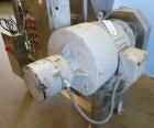 Used Urschel Model 2100 Comitrol Slicer. Urcshel 66755 3K030240U stainless steel cutting head. 30'' Deep stainless steel hopper with 22'' x 30'' infeed opening. Blunt blade horizontal agitator and st...