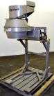 Used Urschel Slicer, Model CC, Stainless Steel. Maximum input product size 3-1/2”. Unit consists of: Swing away feed hopper, upper, and lower discharge chute, bearing housing, and cutting head suppor...