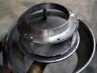 Used Urschel Slicer, Model CC, Stainless Steel. Maximum input product size 3-1/2”. Unit consists of: Swing away feed hopper, upper, and lower discharge chute, bearing housing, and cutting head suppor...