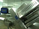 Used Weber Model 402 Meat Slicer capable of speeds up to 2400 slices per minute.Slice thickness .02