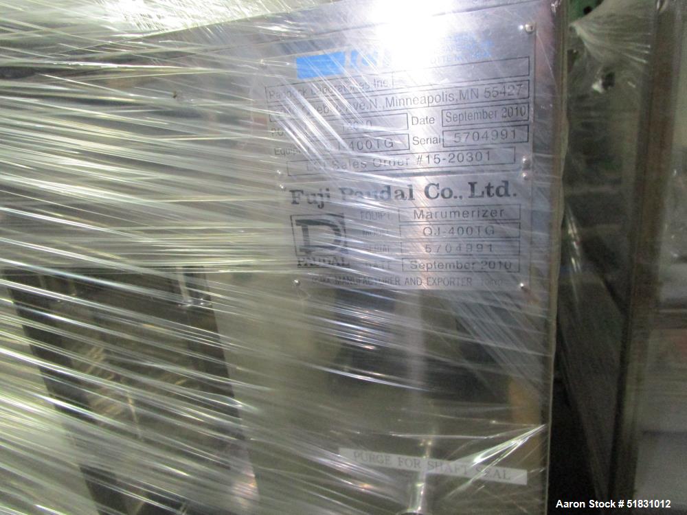 Used Fuji Paudal Marumerizer spheronizer, model QJ400TG, stainless steel construction, with 2.0 mm grooved spheronizing plate with plate lift mechanism, jacketed bowl, side discharge with pneumatical...