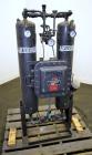 Used Airtek Heatless Desiccant Air Dryer, Model TW-130-N7. Approximate capacity 135 SCFM at 100 psi. (2) Tanks, XP control box. Mounted on a frame.