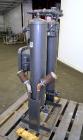 Used Airtek Heatless Desiccant Air Dryer, Model TW-130-N7. Approximate capacity 135 SCFM at 100 psi. (2) Tanks, XP control box. Mounted on a frame.