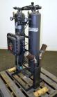 Used Airtek Heatless Desiccant Air Dryer, Model TW-130-N7. Approximate capacity 135 SCFM at 100 psi. (2) Tanks, XP control box. Mounted on a frame.