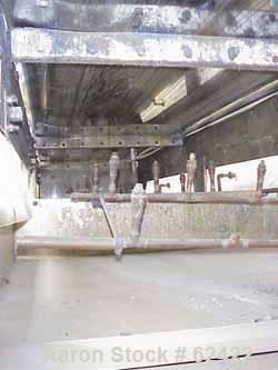 USED: Berndorf cooling belt. Stainless steel belt on 24" dia pulleys, 36" wide x 27'8" long, with (2) applicator rolls 6" dia x 36", driven by 5 hp 230/460/1730 rpm variable speed motor thru a reeves...