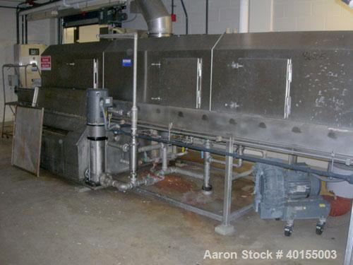 Used:  Ecolab continuous pan washer, model CD-906PW, stainless steel. Approx 51" wide x 15' long wash/dry area, 40" long infeed, 40" long outfeed table. Will wash 18" wide x 38" long x 2-1/2" deep pa...