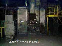 Used National Drying Machinery Gas-Fired Convection Dryer-Cooler, Type AN3, Carbon Steel. Approximately 100 square feet, 5'10" wide x 18' long carbon steel perforated apron type belt, driven by 3/4 h...