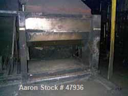 Used National Drying Machinery Gas-Fired Convection Dryer-Cooler, Type AN3, Carbon Steel. Approximately 100 square feet, 5'10" wide x 18' long carbon steel perforated apron type belt, driven by 3/4 h...