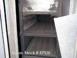 Used National Drying Machinery Gas-Fired Convection Dryer-Cooler, Type AN3, Carbon Steel. Approximately 100 square feet, 5'10" wide x 18' long carbon steel perforated apron type belt, driven by 3/4 h...