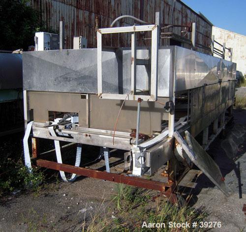 Used Cooling Tunnel, Stainless Steel. Approximate 96" wide x 20' long. Approximately (12) 4" wide plastic belts. Previously used to cool deodorant sticks with forced refrigerated air equipment (not i...