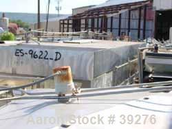 Used Cooling Tunnel, Stainless Steel. Approximate 96" wide x 20' long. Approximately (12) 4" wide plastic belts. Previously used to cool deodorant sticks with forced refrigerated air equipment (not i...