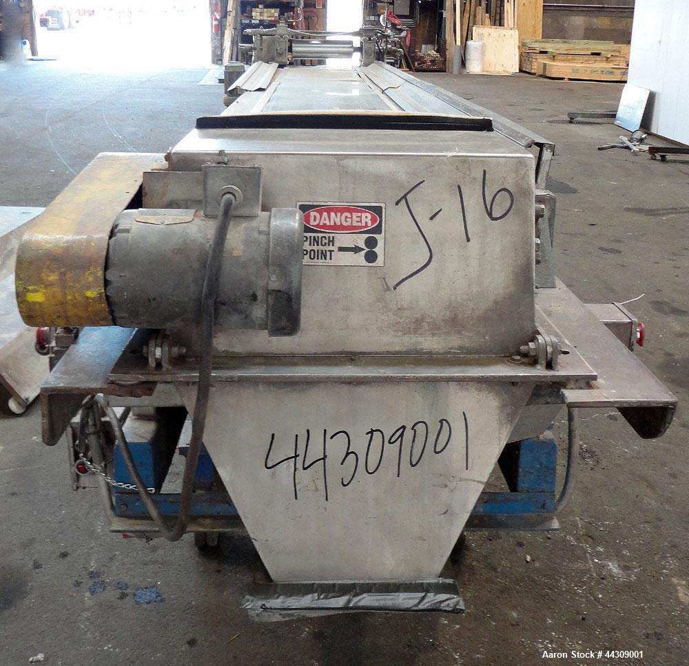 Used Spray Belt Cooler, 301 Stainless Steel. 19-1/2" Wide x 204" long belt. Driven by a 2 hp, 3/60/208-230/460 volt, 1725 rpm gear motor, ratio 10.0 to 1. (2) Cored feed roll assemblies, driven by an...