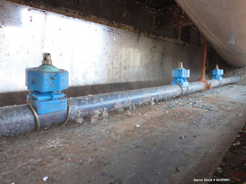 Used Spray Belt Cooler, 301 Stainless Steel. 19-1/2" Wide x 204" long belt. Driven by a 2 hp, 3/60/208-230/460 volt, 1725 rpm gear motor, ratio 10.0 to 1. (2) Cored feed roll assemblies, driven by an...