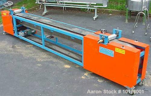 Used Sandvik Belt Cooler (Sandvik Process Systems) 12" x 16' long with polished stainless steel belt. Dual 12" wide x 4.5" diameter jacketed rolls are mounted above cooling belt at beginning and term...