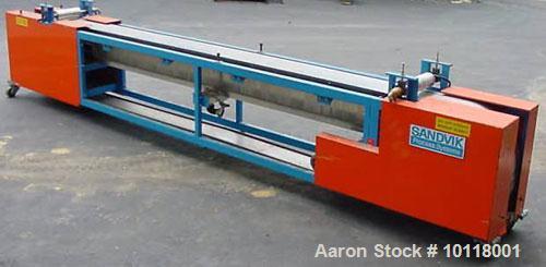Used Sandvik Belt Cooler (Sandvik Process Systems) 12" x 16' long with polished stainless steel belt. Dual 12" wide x 4.5" diameter jacketed rolls are mounted above cooling belt at beginning and term...