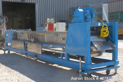 Used Sandvik Spray Belt Cooler, 301 Stainless Steel. 19-3/4" Wide x 180" long belt. Driven by a 3/4hp, 3/60/208-230/460 Volt, 1725 rpm gear motor, ratio 200 to 1. Approximately 11’9’’ effective cooli...