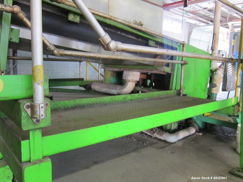 Used Sandvik Model SST stainless steel belt flaker with 55"  wide x 40' long belt.  Last used to cool asphalt used as backing on roofing paper.  Originally installed mid 1980’s, belt was last replace...