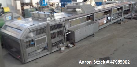 Used Sandvik 1000mm Wide x 10,000mm Long Stainless Steel Inclined Belt Cooler. Approximately 1950kg/hr throughput capacity. Belt is driven by a 0.30/3 kw, 144/1440 rpm, 415 volt motor through a renol...