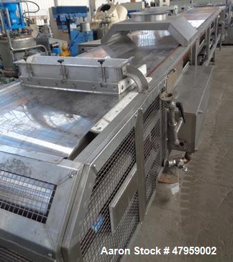 Used Sandvik 1000mm Wide x 10,000mm Long Stainless Steel Inclined Belt Cooler. Approximately 1950kg/hr throughput capacity. Belt is driven by a 0.30/3 kw, 144/1440 rpm, 415 volt motor through a renol...